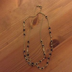 Long gold necklace